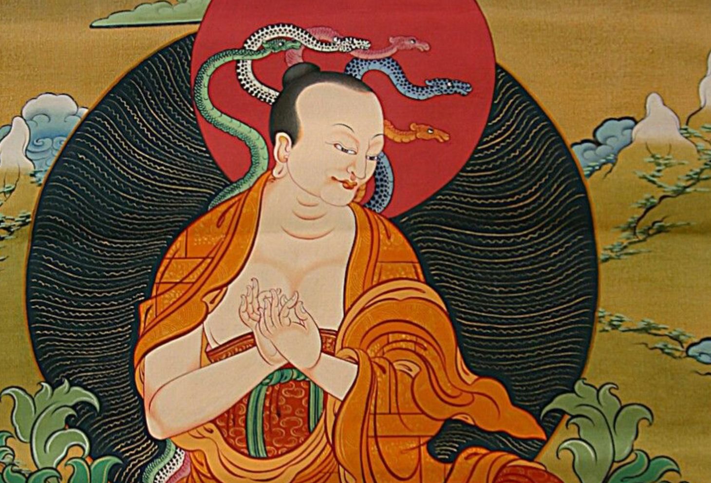 A colourful painting of Indian philosopher Nāgārjuna with five snakes just hanging out on his shoulders.